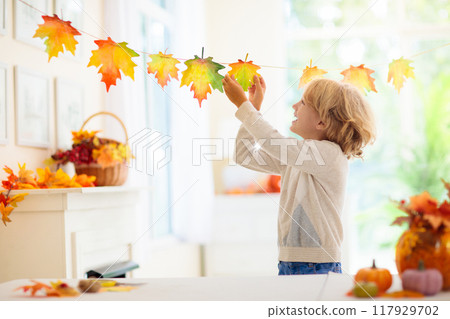 Autumn home decoration. Family decorating house. Autumn home decoration. Family decorating house. 117929702