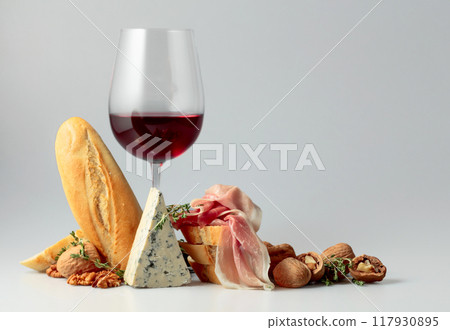 Red wine with traditional Mediterranean snacks. Red wine with traditional Mediterranean snacks. 117930895