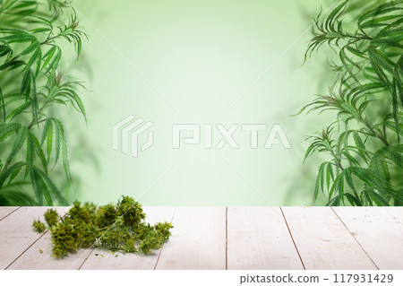 Medicinal cannabis on white wooden background with copy space 117931429