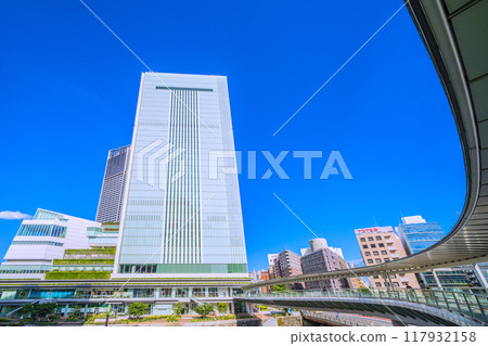 Yokohama cityscape in Japan: View of Yokohama City Hall and other buildings from the pedestrian bridge in front of the new south exit of Sakuragicho Station (August 17th) Yokohama cityscape in Japan: View of Yokohama City Hall and other buildings from the pedestrian bridge in front of the new south exit of Sakuragicho Station (August 17th) 117932158