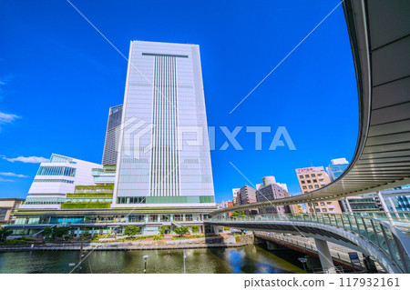 Yokohama cityscape in Japan: View of Yokohama City Hall and other buildings from the pedestrian bridge in front of the new south exit of Sakuragicho Station (August 17th) Yokohama cityscape in Japan: View of Yokohama City Hall and other buildings from the pedestrian bridge in front of the new south exit of Sakuragicho Station (August 17th) 117932161