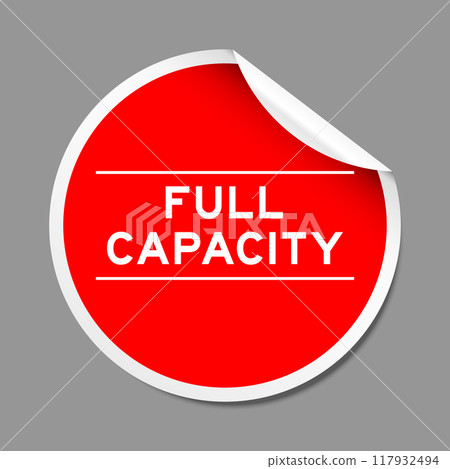 Red color peel sticker label with word full capacity on gray background 117932494