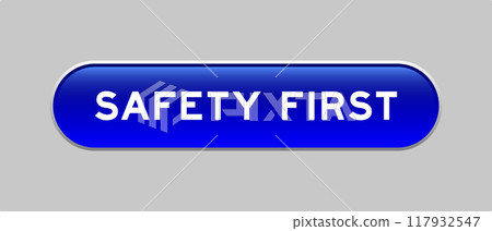 Blue color capsule shape button with word safety first on gray background Blue color capsule shape button with word safety first on gray background 117932547