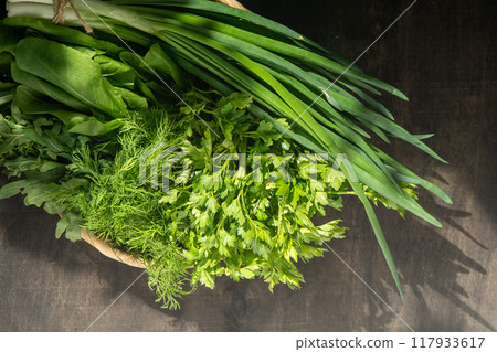 Green onions, spinach, parsley and dill. Vitamin food. Prepare greens for salad. 117933617