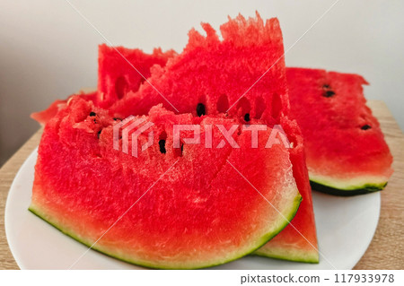 Close-up of ripe juicy red watermelon pieces Close-up of ripe juicy red watermelon pieces 117933978