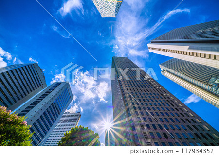 Tokyo cityscape in Japan: A ray of hope...View of Kogakuin University, Shinjuku Center Building, Sompo Japan, etc. = August 20th 117934352