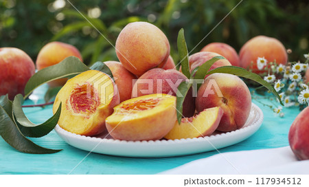 Still life of ripe peaches and nectarine.Healthy harvest from home rustic garden 117934512