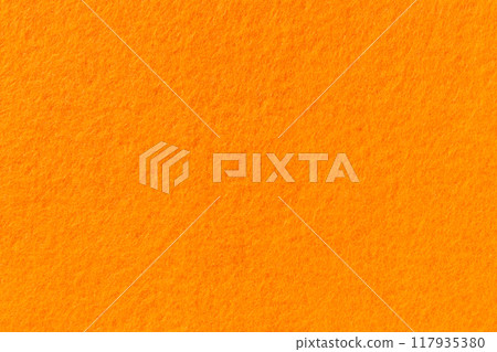 Macro image of felt texture background fabric material illustration wallpaper orange color Macro image of felt texture background fabric material illustration wallpaper orange color 117935380
