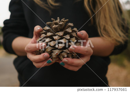 teen girl holding big cone 117937081