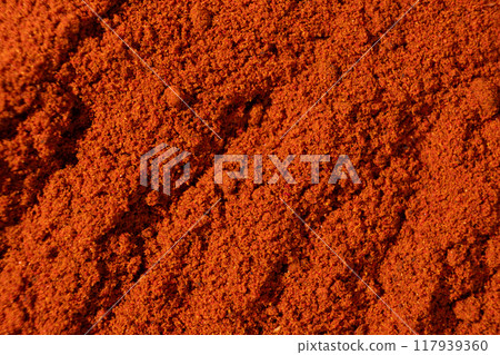 Ground paprika, red terracotta spice background, art in cooking. Ground paprika, red terracotta spice background, art in cooking. 117939360