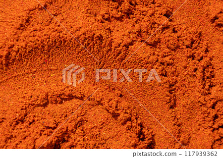 Ground paprika, red terracotta spice background, art in cooking. 117939362