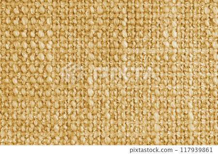Texture of yellow jacquard fabric of rough weave, cloth structure background, close up, macro 117939861