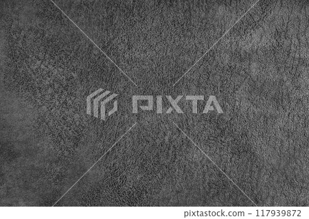 Black suede leather texture with embossed pattern background, fleecy cloth texutre macro 117939872