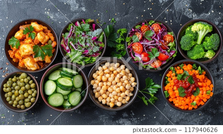 Bowls of fresh food ingredients, fruits and vegetables 117940626