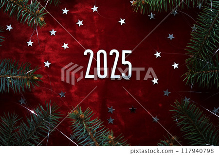 New Year red 2025 background. Number of the coming year in Christmas decoration. 117940798