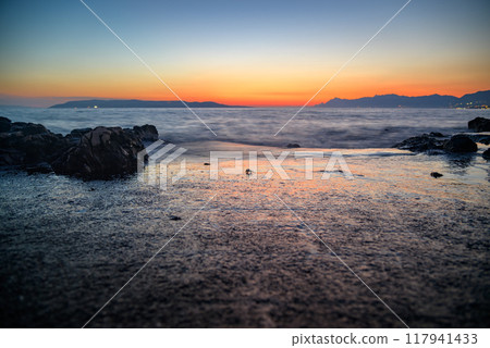 Colorful sunset on Makarska Riviera, popular touristic coastline of the Adriatic Sea in Split-Dalmatia County of Croatia 117941433
