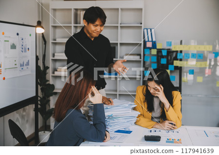 Asian women are stressed while working on laptop, Tired asian businesswoman with headache at office, feeling sick at work, copy space 117941639