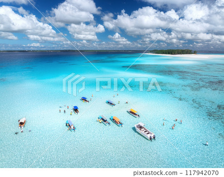 Aerial view of boats in clear azure sea in summer. Top view 117942070