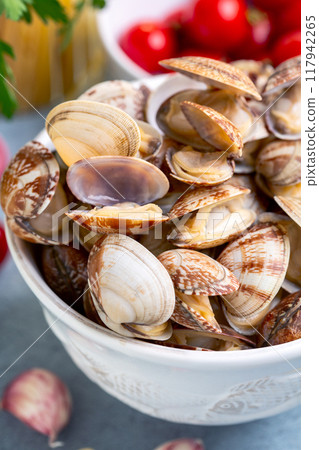 Bowl of clams. 117942265