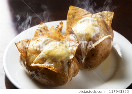 Boiled potatoes with butter Boiled potatoes with butter 117943833