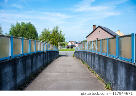 Ternat, Flemish Brabant, Belgium, August 31, 2024 - Pedestrian and cycling road over the raiwlay tracks 117944671