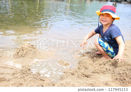 Playing in the water 117945213