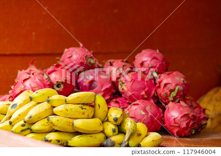 Tropical fruits: banana and dragon fruit 117946004