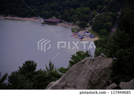 Stone overlook above a popular beach lake Stone overlook above a popular beach lake 117949085
