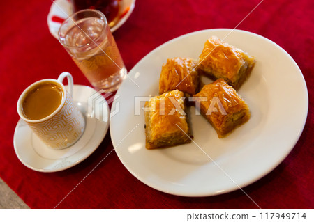 Turkish dessert baklava with honey and nuts 117949714