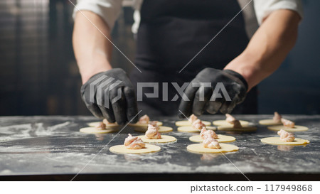 Professional Chef Starting The Closure Of Ravioli  117949868