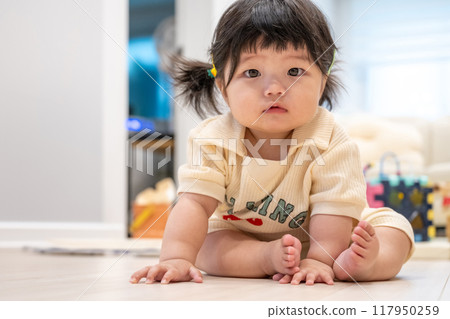 portrait of a baby girl 117950259