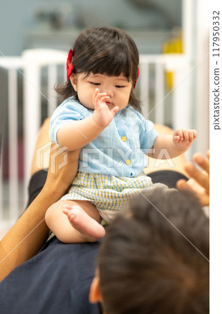 portrait of a baby girl 117950332