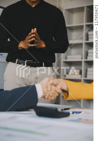Business handshake for teamwork of business merger and acquisition,successful negotiate,hand shake,two businessman shake hand with partner to celebration partnership and business deal concept 117950471