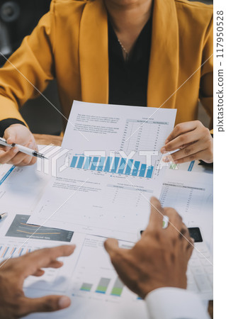 Group of Young Asian business team creative businesspeople coworker in office Happy to be successful partnership teamwork celebrating achievement and success concept. Group of Young Asian business team creative businesspeople coworker in office Happy to be successful partnership teamwork celebrating achievement and success concept. 117950528