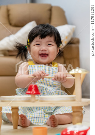 portrait of a baby girl portrait of a baby girl 117951295