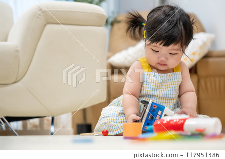 portrait of a baby girl 117951386