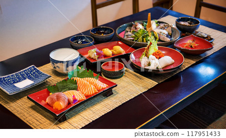 Table with Japanese cuisine 03 117951433
