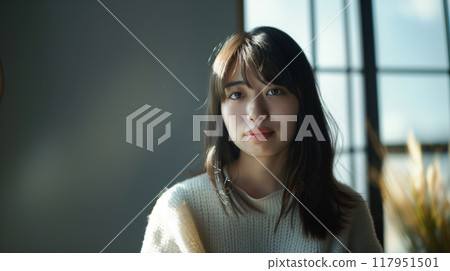 Portrait of a melancholic young Japanese woman 117951501