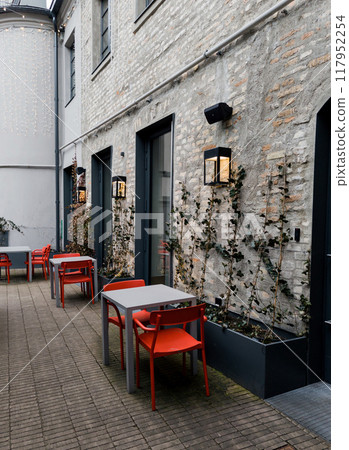 European empty chairs and tables 117952254
