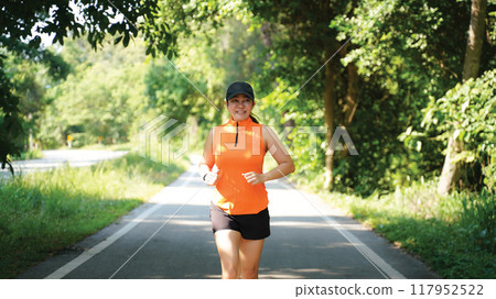 Healthy woman jogging run and workout on road outdoor 117952522