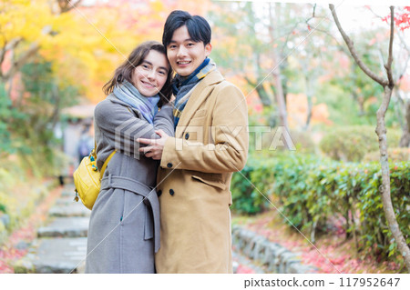 Young couple Autumn leaves image 117952647