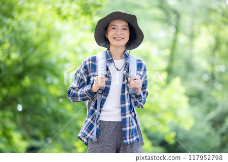 Middle-aged woman enjoying hiking 117952798