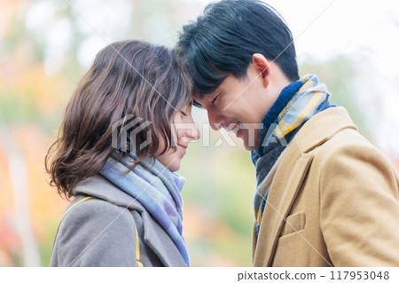 Young couple Autumn leaves image 117953048