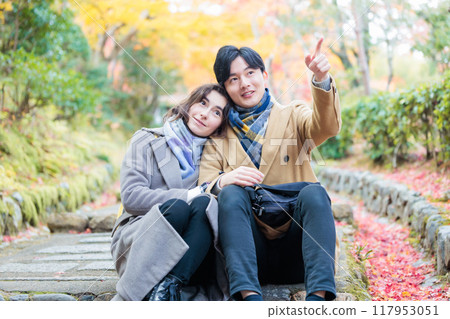 Young couple Autumn leaves image Young couple Autumn leaves image 117953051