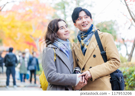 Young couple Autumn leaves image 117953206
