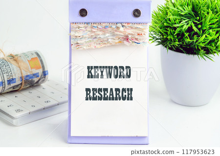 KEYWORD RESEARCH written a conceptual phrase on a desktop tear-off calendar KEYWORD RESEARCH written a conceptual phrase on a desktop tear-off calendar 117953623