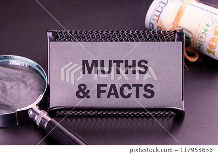 Business, finance and fact vs myth concept. Fact vs myth symbol. Concept words Fact and myth on the card in dark colors Business, finance and fact vs myth concept. Fact vs myth symbol. Concept words Fact and myth on the card in dark colors 117953636