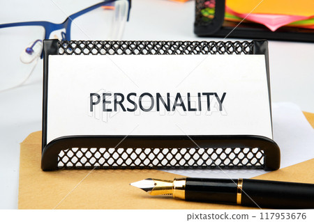 Concept word PERSONALITY in a business card on a stand Concept word PERSONALITY in a business card on a stand 117953676
