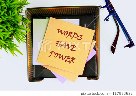 WORDS HAVE POWER TEXT written on the sticker in the stand, top view 117953682