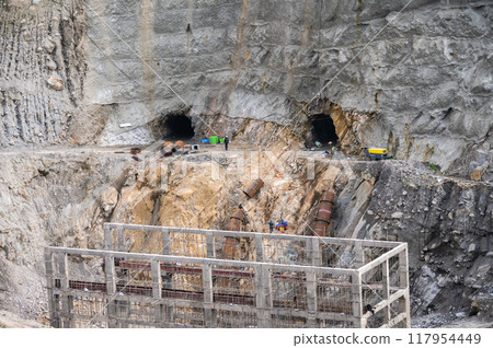 The construction site in Syabrubesi of Nepal. Many infrastructure projects in Nepal being financed by China. The construction site in Syabrubesi of Nepal. Many infrastructure projects in Nepal being financed by China. 117954449